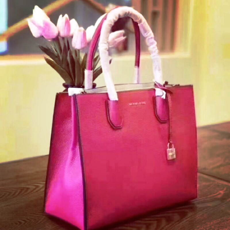 mk mercer pink and white