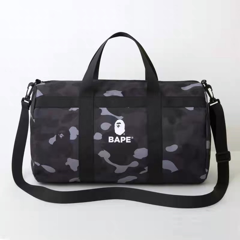 🎪✈️全新正品日本限定BAPE A BATHING APE旅行袋兩用雜誌圓桶包 黑迷彩✈️🎪