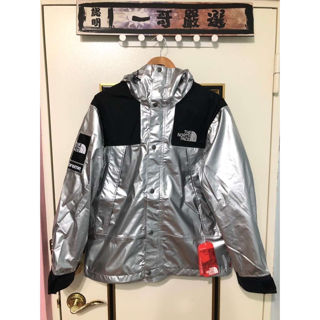 supreme north face jacket silver