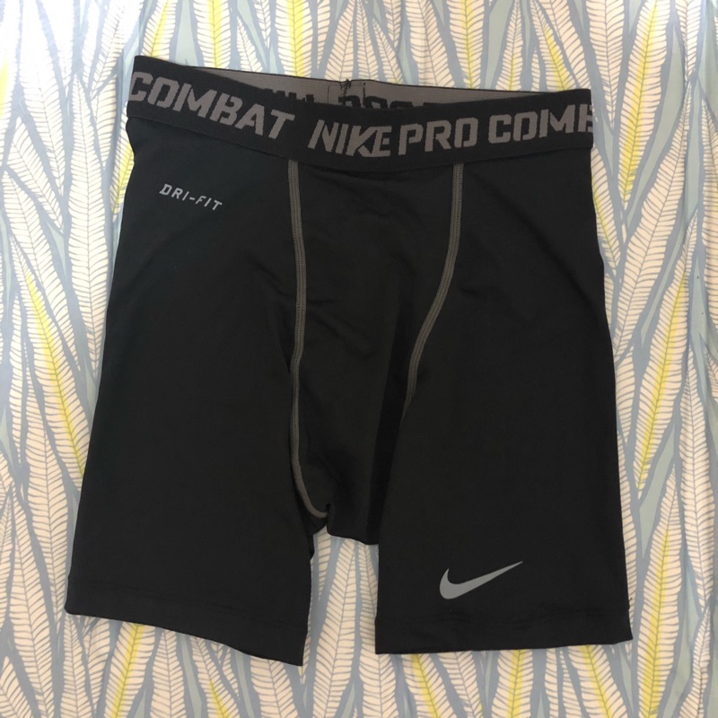 Nike 男版短束褲