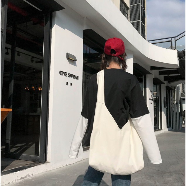 P10067 韓國直送 送子鳥 綁帶包 打結包 帆布 素面 側背包 肩背包 特價399元