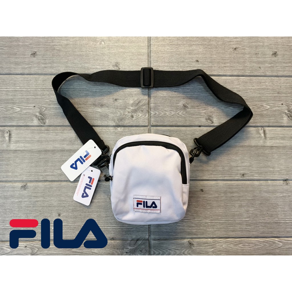 塞爾提克~FILA 饅頭包 小包 側背包 隨身小袋 胸包 雙拉鍊夾層 帆布材質(白色)斐樂正品