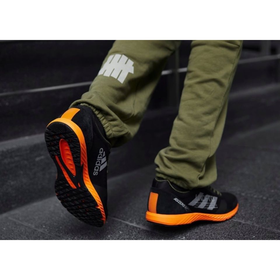 adidas consortium x undefeated adizero rc