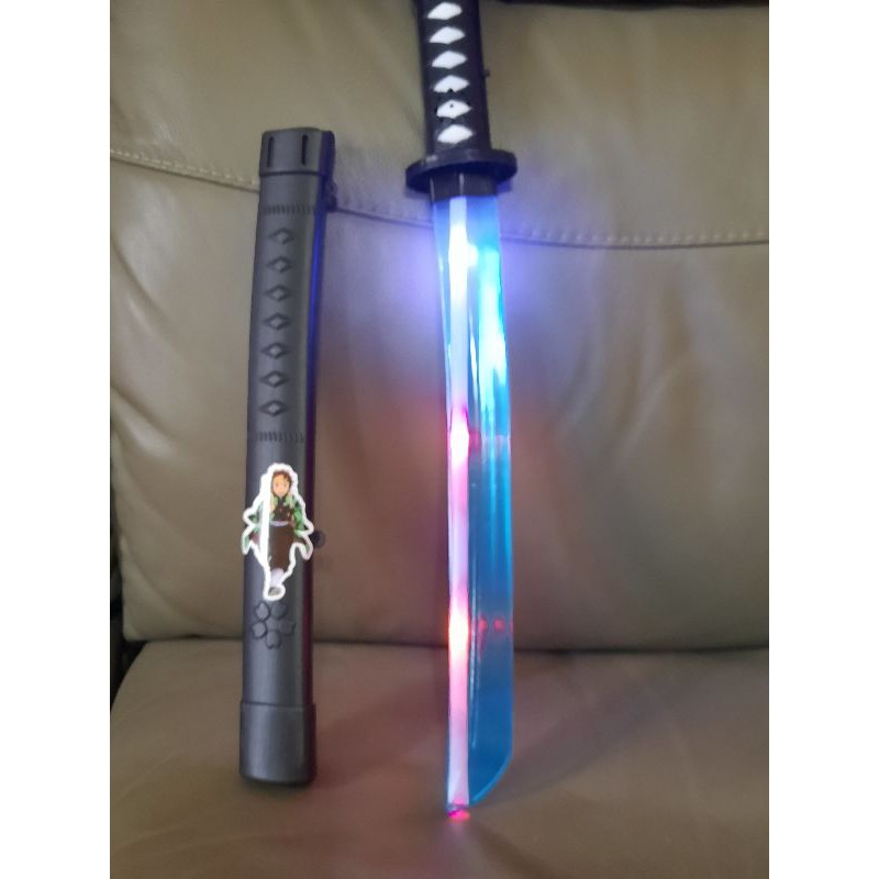 鬼滅之刃兒童男孩刀劍玩具武器發光武士刀帶刀鞘小孩玩具3歲以上生日禮物款式隨機出尺寸約46公分 蝦皮購物