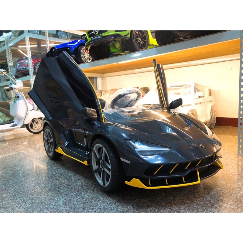 【完美老爸童車精品店】兒童電動車 藍寶堅尼SVJ造型電動車 兒童騎乘類玩具 兒童超跑 雙驅 皮椅 搖擺