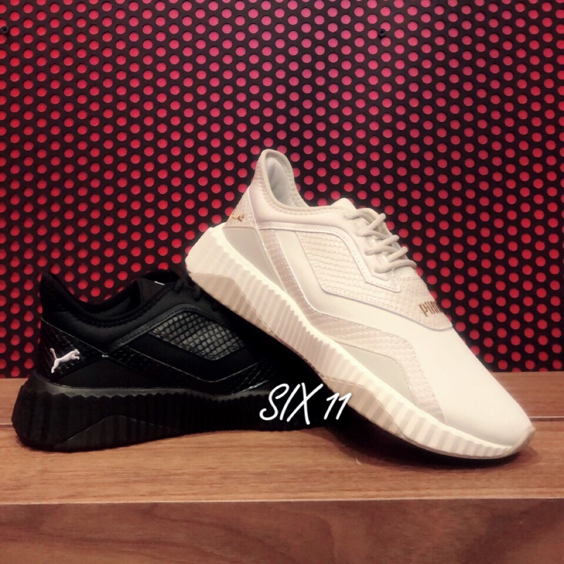 puma defy stitched croc