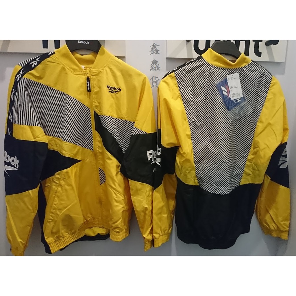 yellow reebok windbreaker