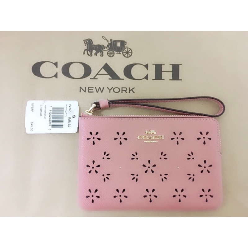 Coach雕花小手拿