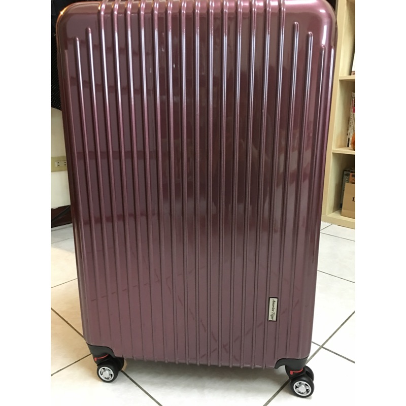 America tiger 29吋鏡面大行李箱，飛機輪、海關鎖