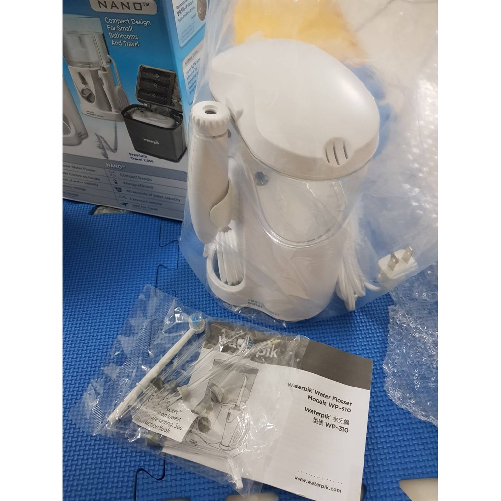 6支噴頭 Waterpik 家/旅兩用高效能沖牙機WP-310W/WP-310 範例不賣