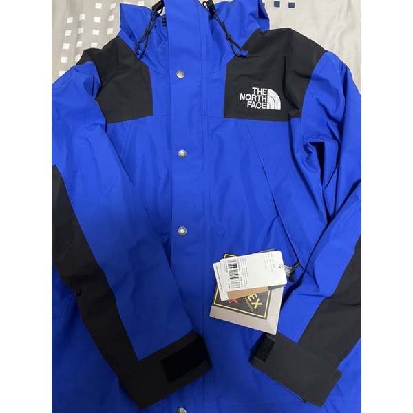 The north face 1990 mountain jacket gtx hot sale aztec blue