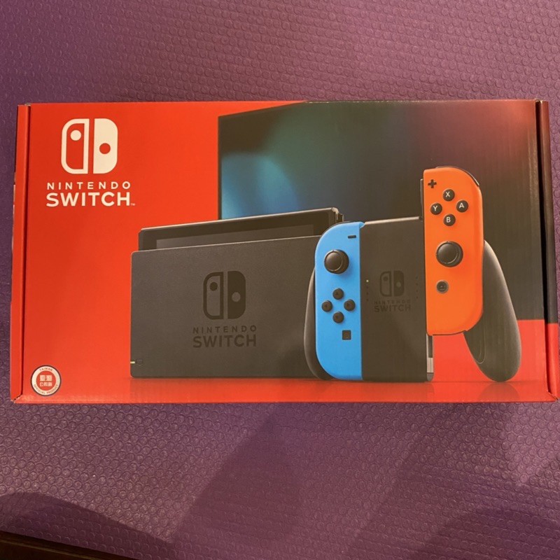 Nintendo Switch 電力加強版主機（紅藍手把配色）