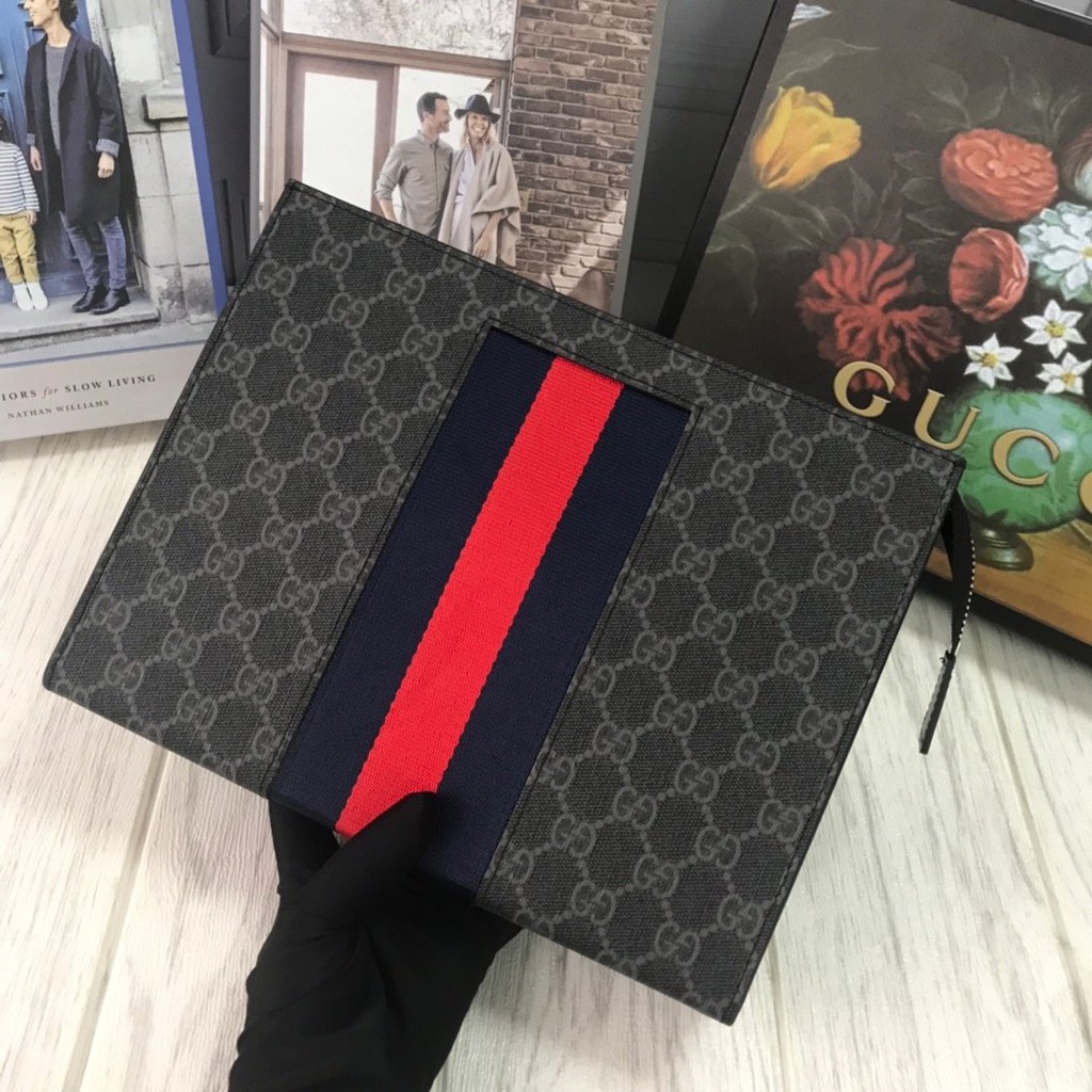 gucci supreme web pouch