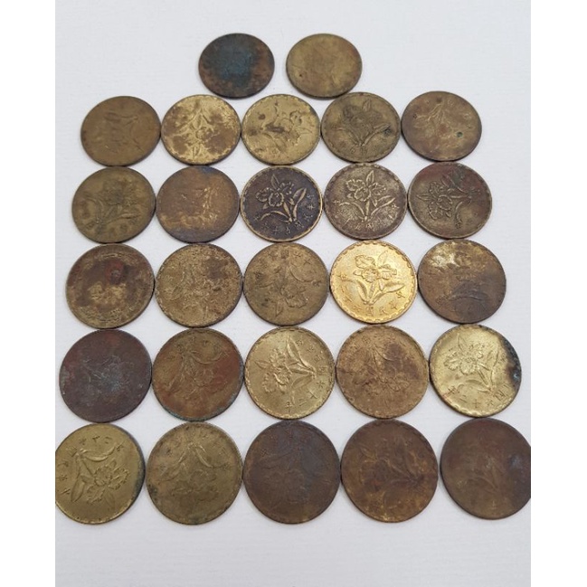 錢幣蘭花伍角~58枚黃銅幣56年.59年.60年.62年。