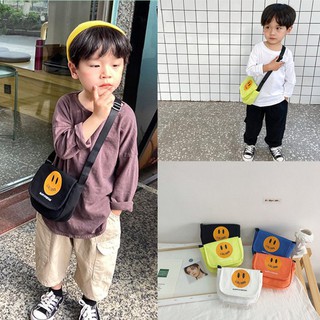 大英精品優選現貨可批發 兒童包包洋氣笑臉潮可愛帥氣男童小挎包韓版百搭帆布小女孩斜挎包胸包 拉鍊包 單肩包 零錢包 造型挎