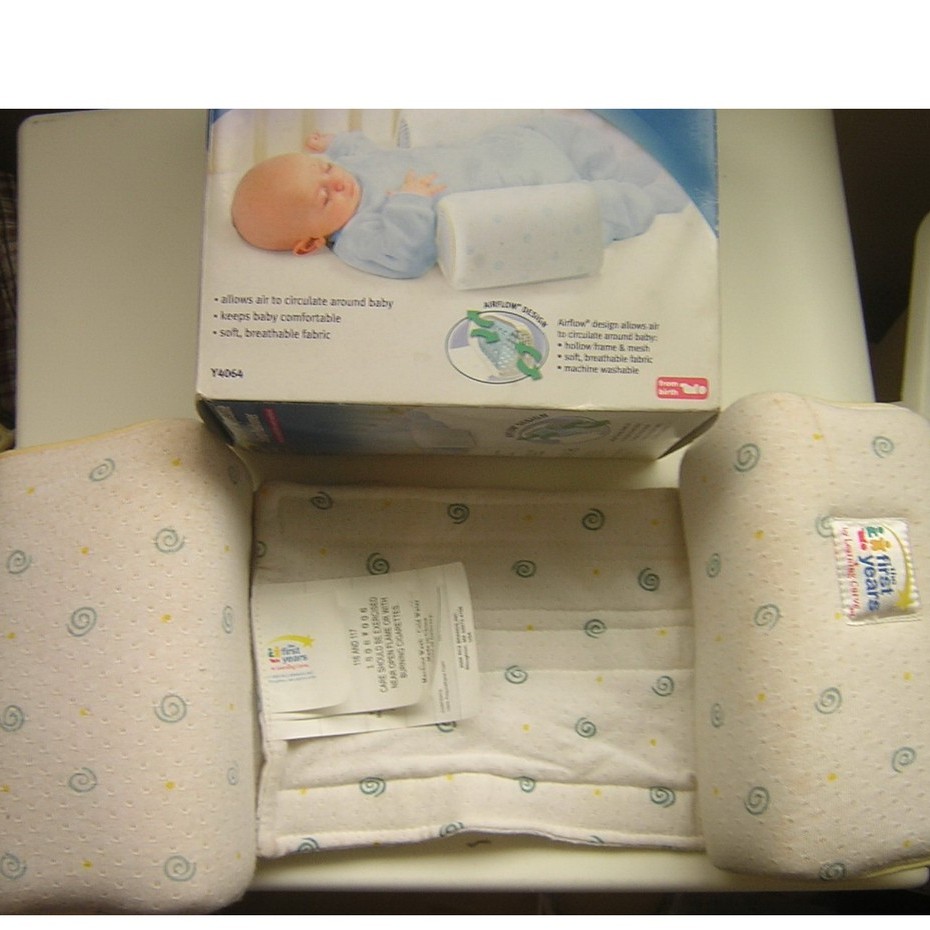 the first years sleep positioner