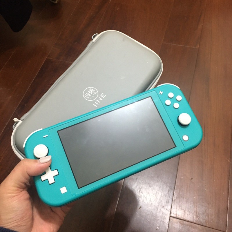 二手藍綠色switch lite+良值外出殼