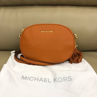 MICHAEL KORS🧡橘色橢圓流蘇小包