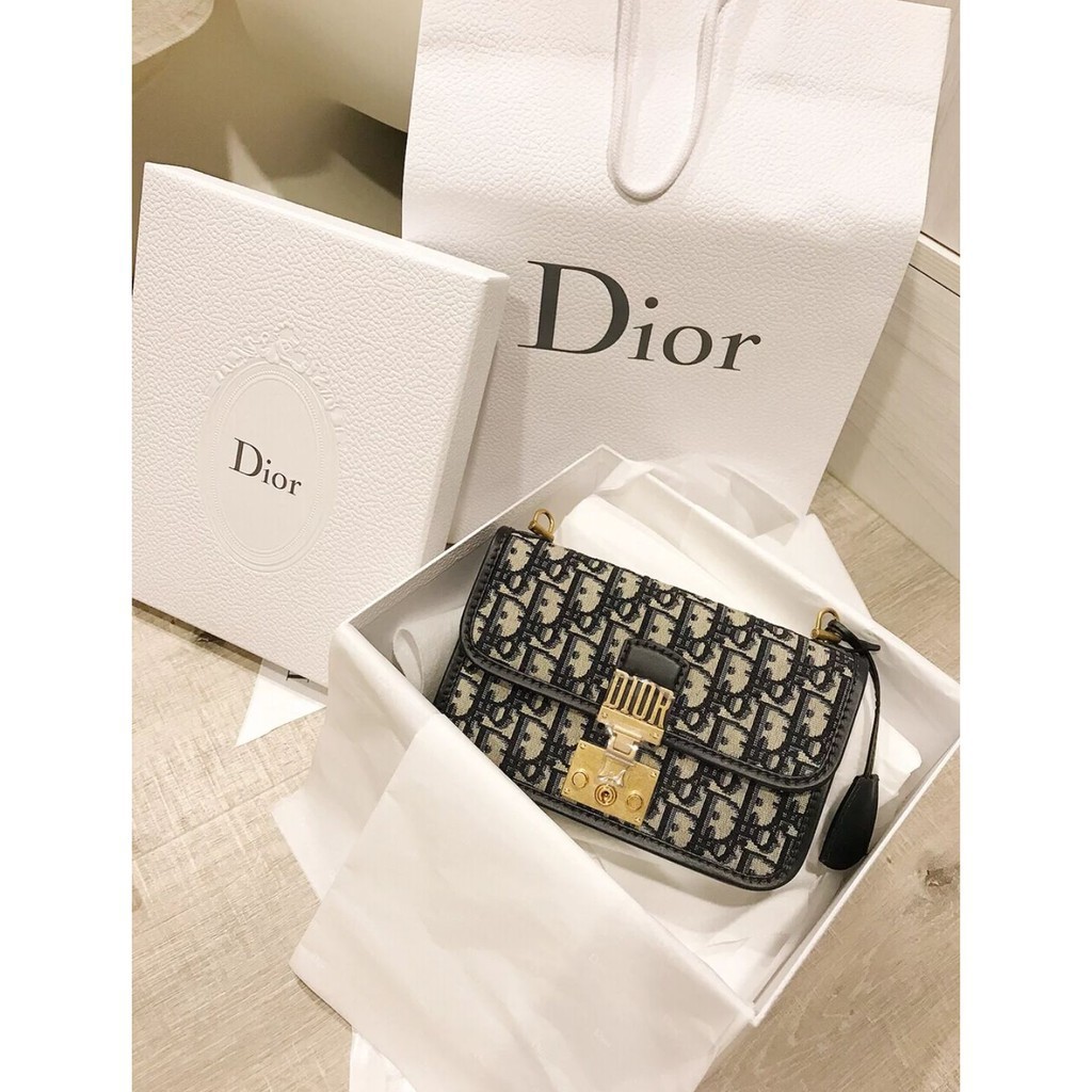 saddle dior oblique clutch