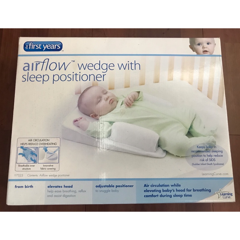 the first years sleep positioner