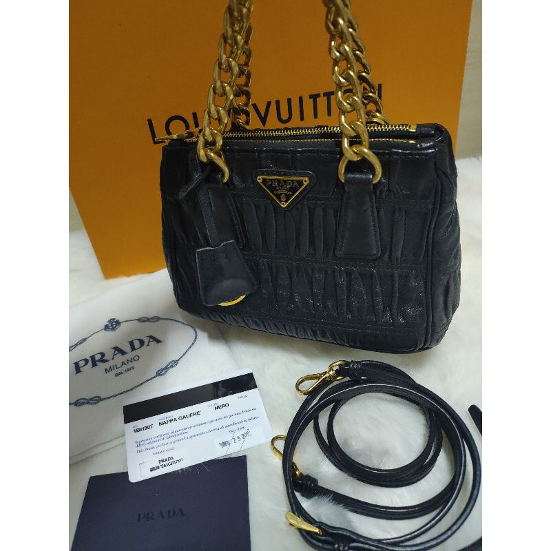 Prada WOC 黑金斜背包