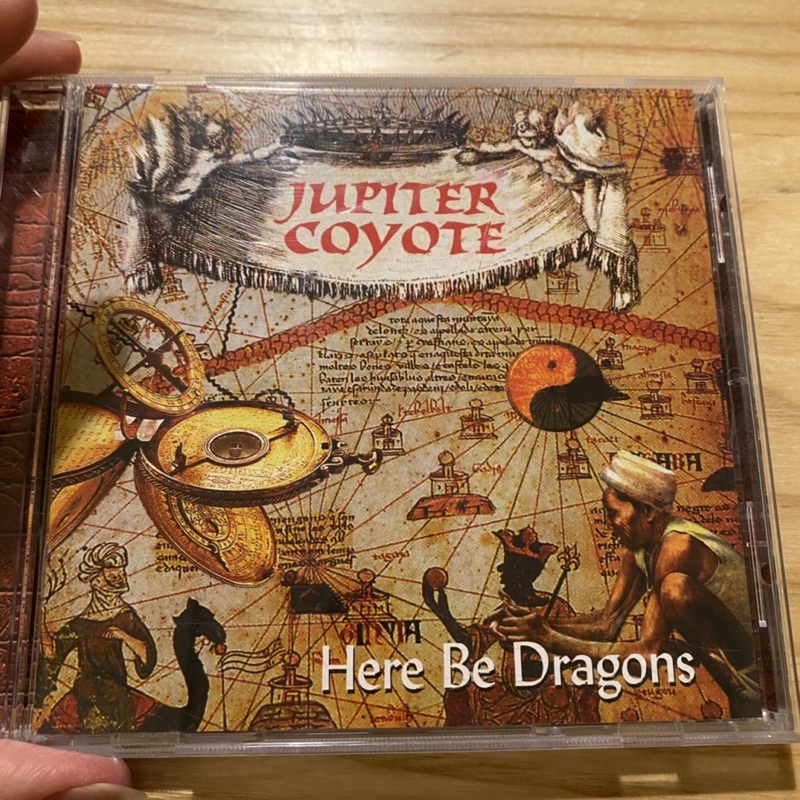 喃喃字旅二手CD《JUPITER COYOTE-HERE BE DRAGONS》1998