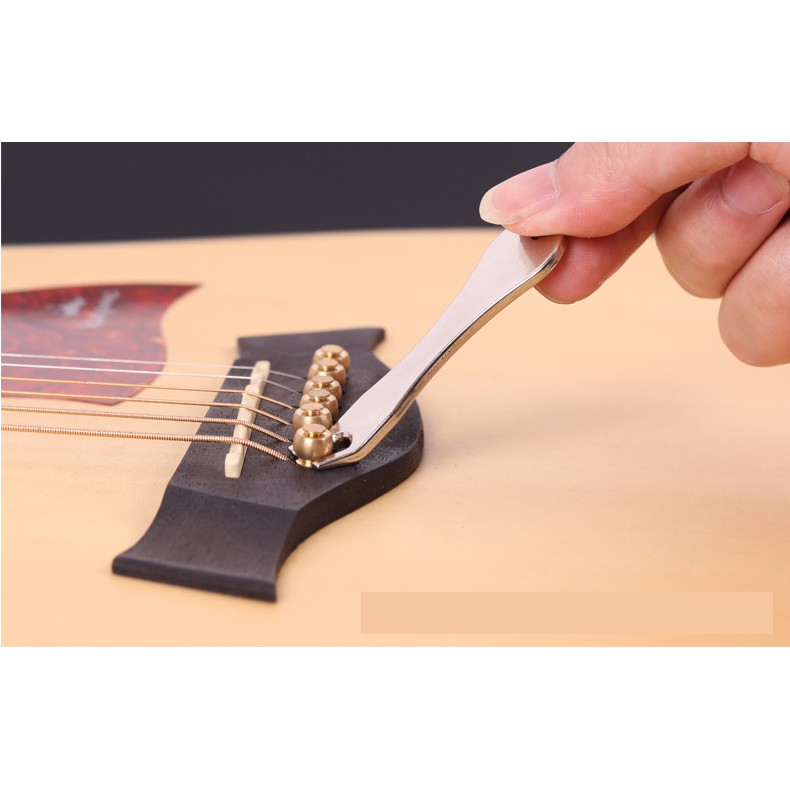 台灣現貨 吉他工具金屬拔釘器換弦工具拔弦釘起釘器弦釘 蝦皮購物