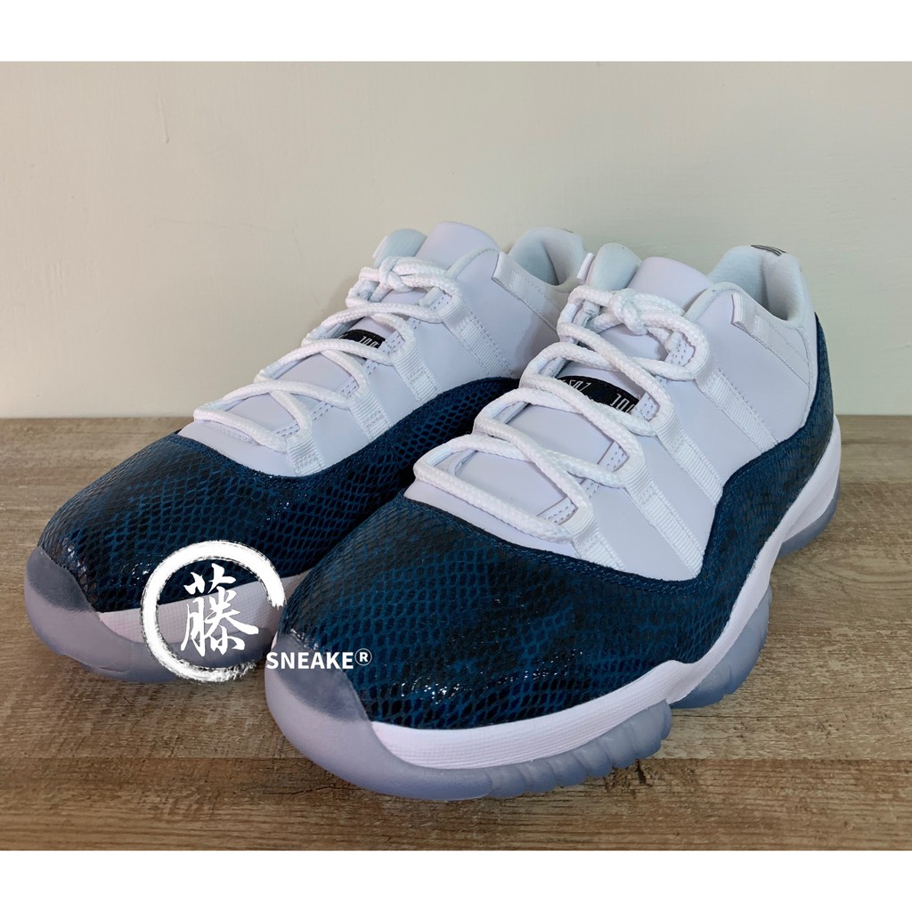 dark blue jordan 11 low