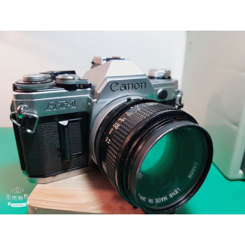 老士官長收藏二手功能正常（看內文）（早期單眼相機canon at1少有流通款）需整理功能正常，單機一台+一個鏡頭