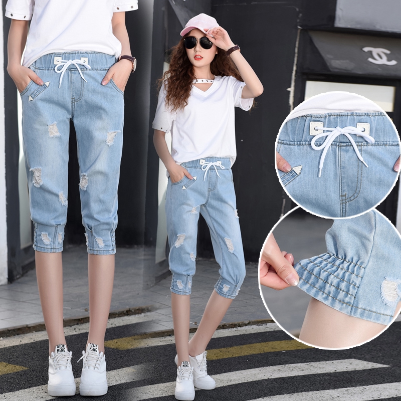 現貨 破洞牛仔七分褲女70kg可穿松緊腰七分褲女夏季新款寬松韓版大碼薄款哈倫褲磨白束腳中褲现货七分牛仔裤女