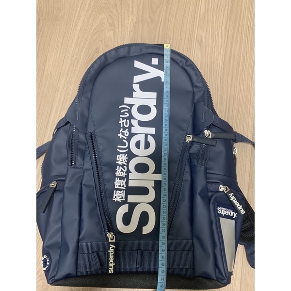 Superdry藍色防水後背包。可裝筆電。日本購入。僅背過一次。