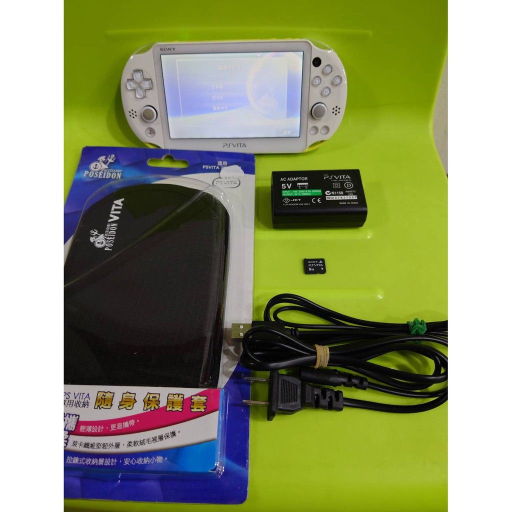 Psvita 00型台灣機青檸 8g記憶卡 充電 保護貼已貼 攜帶布包一個 中古7成5新 沒附外盒 蝦皮購物