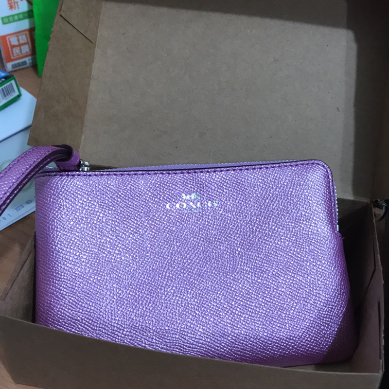 COACH時尚粉紫手拿包