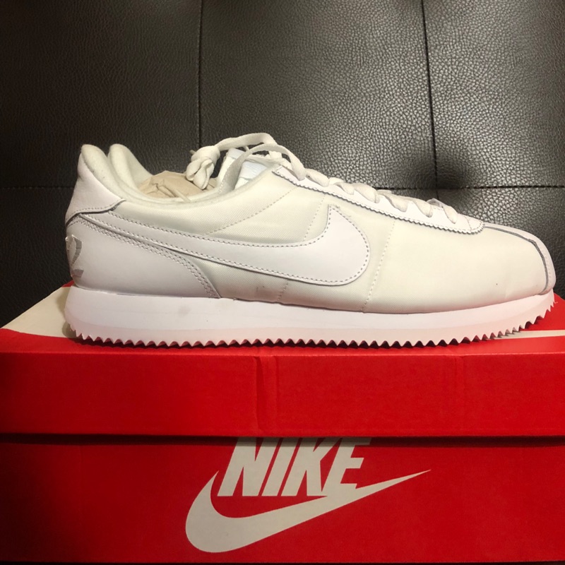 nike cortez triple white