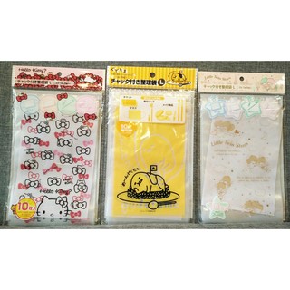 日本貨 三麗鷗正版授權旅行收納袋慵懶蛋黃哥HELLO KITTY凱蒂貓TWINS雙子星出國收納袋讓行李箱整齊好收取
