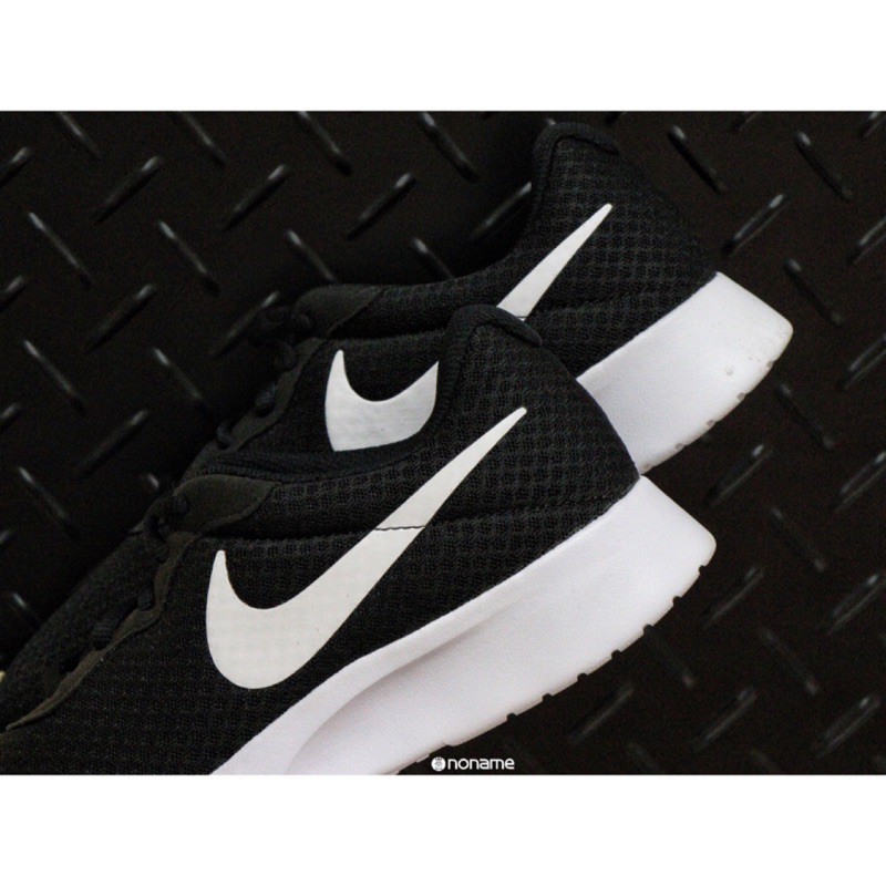 nike tanjun run small