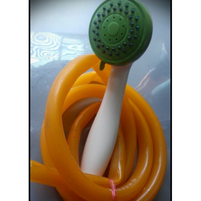 賣1元 有段式蓮蓬頭+至少有150cm的橘色塑膠軟水管