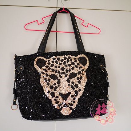 百円ショップ 黑色亮片花豹頭側背包 蝦皮購物