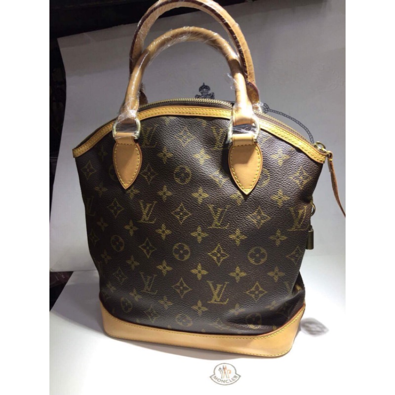 Louis Vuitton LOCKIT MM SUHALI Golden Metallic Leather Goatskin ref.70703 -  Joli Closet