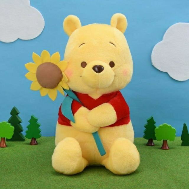 小熊維尼害羞握著太陽花的絨毛娃娃 迪士尼小熊維尼娃娃winnie the pooh 向日葵  日本景品