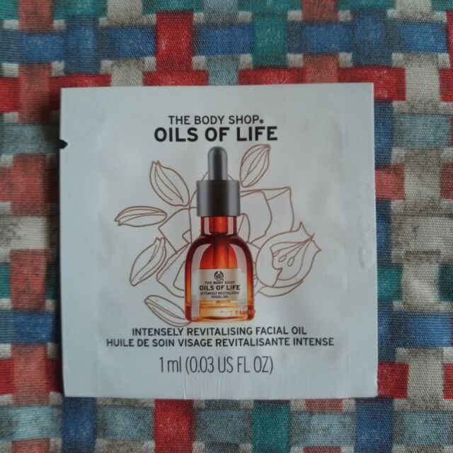 The body shop 煥顏金萃精華油 1mL