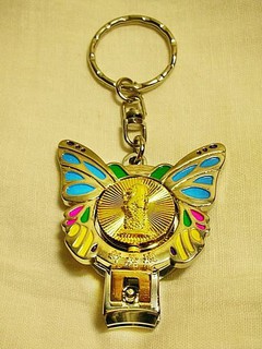#L.全新少見新加坡獅頭魚浮雕造型鍍金合金指甲剪吊飾!!--提供給需要的人!/6房樂箱61/-P