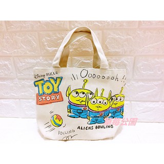 草莓公園【日本進口 Disney 迪士尼 玩具總動員 三眼怪 超可愛立體造型 水餃包 手提袋 帆布包 手提包】