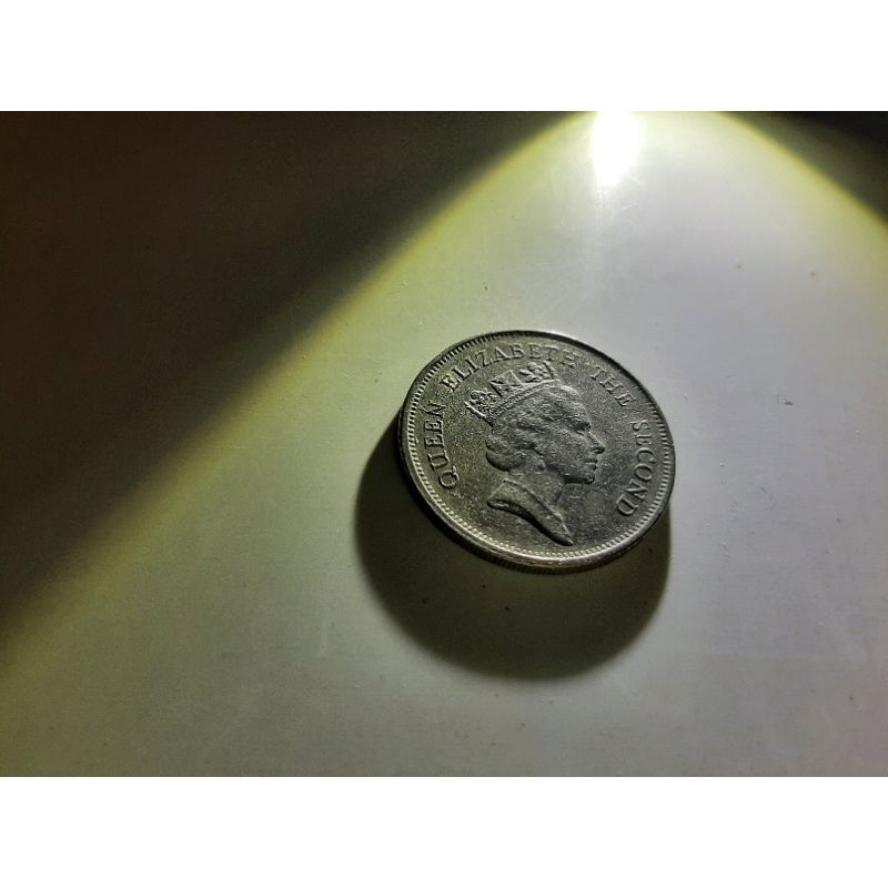 絕版英女王頭港幣1元硬幣，有兩款女王頭像。隨機出貨.謝謝