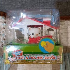 娃娃機。貓咪老鼠可愛存錢筒