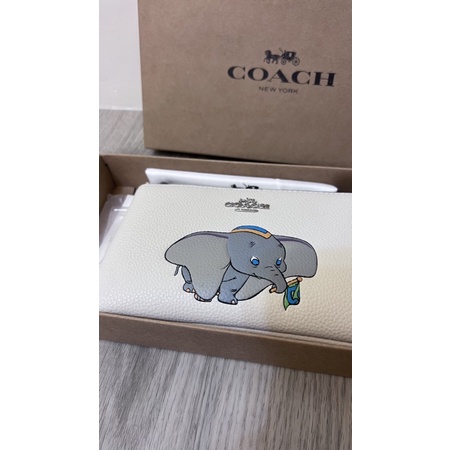 coach 小飛象手拿包