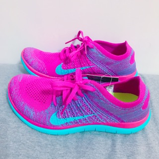 Nike 女生桃紅慢跑鞋彩虹Free 40號25.5公分631050-501