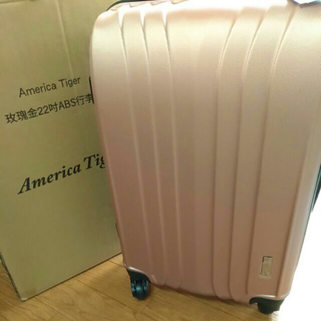 America tiger 22吋abs 行李箱，玫瑰金
