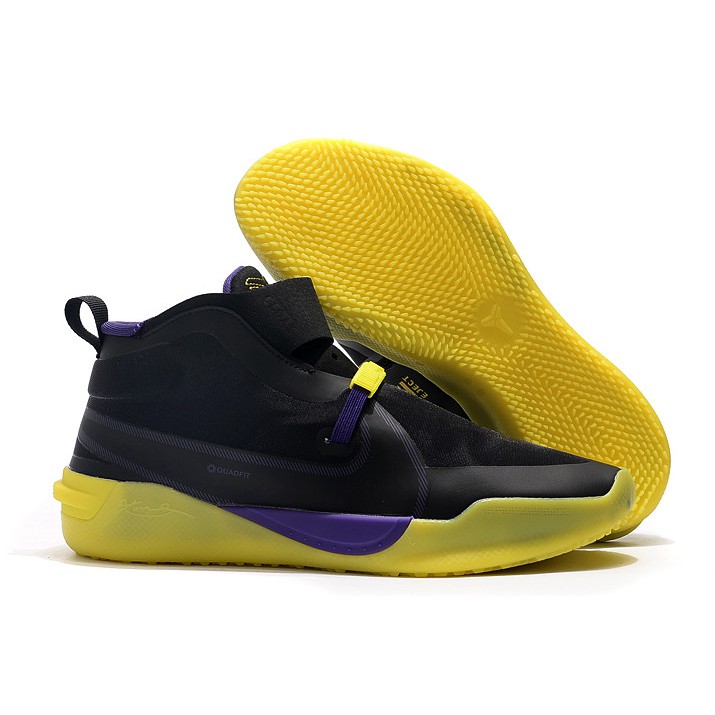 purple and yellow basketball shoes