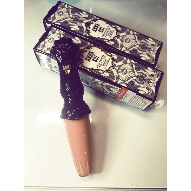 Anna sui 魔鏡光防曬唇蜜 700 SPF20 專櫃正貨商品價格特惠中！！